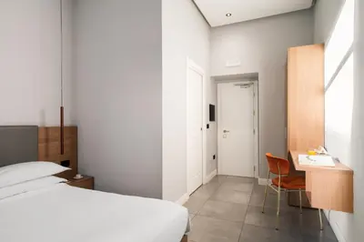 Letto o letti in una camera di The Grey