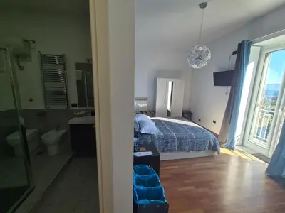 Letto o letti in una camera di B&B Musica e Mare