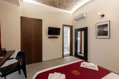 Letto o letti in una camera di Annunziata Guesthouse, Centro Storico
