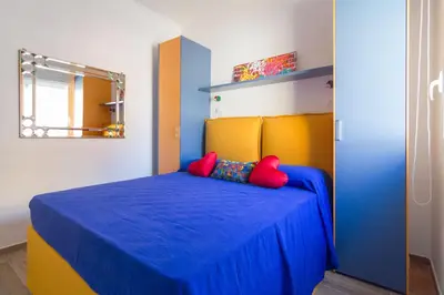 Letto o letti in una camera di San Gennaro modern flat