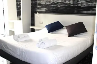 Letto o letti in una camera di Beverello Rooms