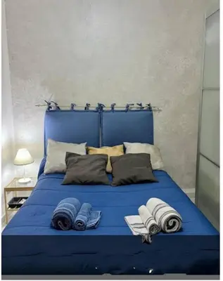 Letto o letti in una camera di Vomero House with Free Parking 410 cm