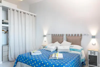 Letto o letti in una camera di La Casa del Faro 31