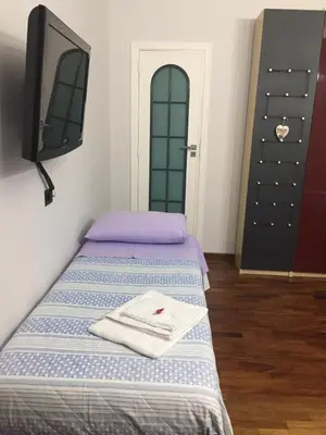 Letto o letti in una camera di Mapi Room