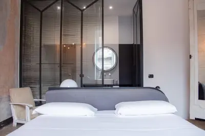 Letto o letti in una camera di Tutt 'e Sant Luxury Rooms