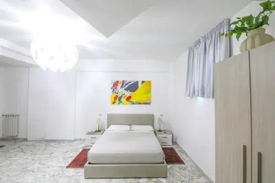 Letto o letti in una camera di Municipio Suite