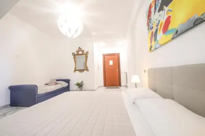 Letto o letti in una camera di Municipio Suite