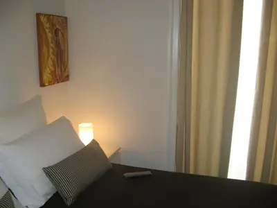 Letto o letti in una camera di iBed Napoli B&B