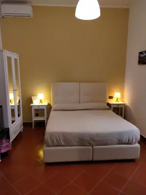 Letto o letti in una camera di Dante Rooms