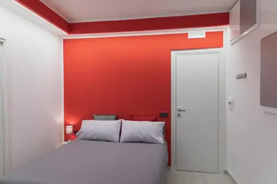 Letto o letti in una camera di Napoli Capitale