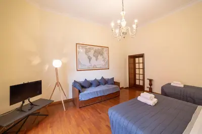 Letto o letti in una camera di The Dante Apartment By HouseinNaples