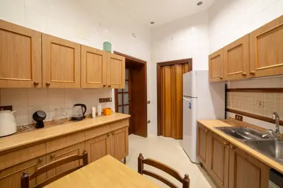 Cucina o angolo cottura di The Dante Apartment By HouseinNaples