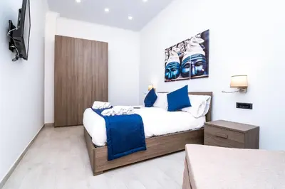 Letto o letti in una camera di Palazzo Settembrini 49