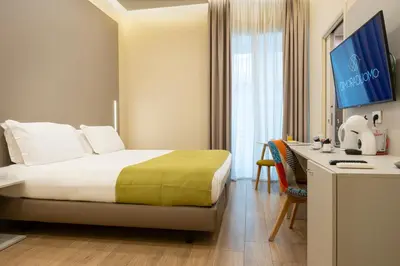Letto o letti in una camera di DIMORA DUOMO