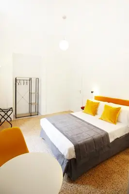 Letto o letti in una camera di Le Quinte del Bellini