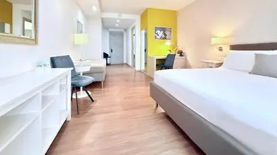Letto o letti in una camera di Prestige Rooms Chiaia