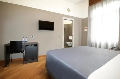 Letto o letti in una camera di Piazza Carità