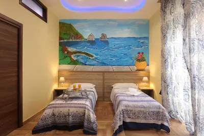Letto o letti in una camera di Authentic Neapolis in the hearth of the center