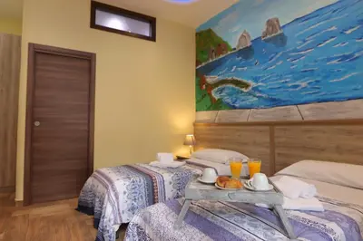Letto o letti in una camera di Authentic Neapolis in the hearth of the center