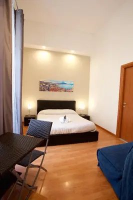 Letto o letti in una camera di B&B MetròNapoli