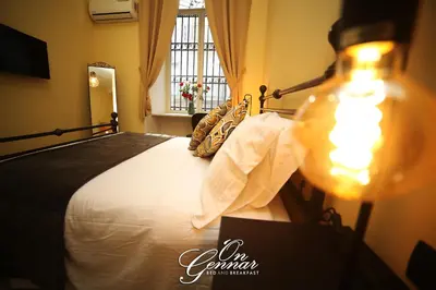Letto o letti in una camera di On Gennar