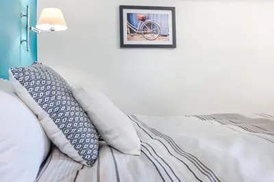 Letto o letti in una camera di Manuela Apartments Piazza del Plebiscito Centro