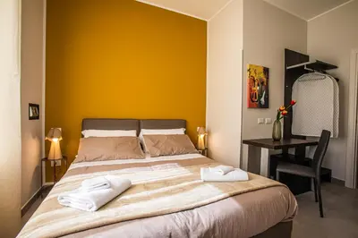 Letto o letti in una camera di Garibaldi 136