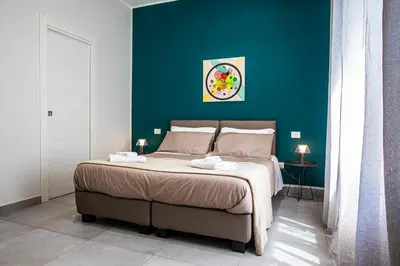 Letto o letti in una camera di Garibaldi 136