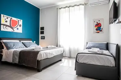 Letto o letti in una camera di Garibaldi 136