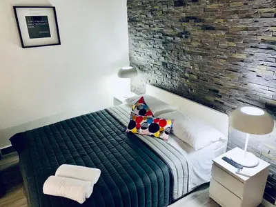 Letto o letti in una camera di FRANZ GUEST HOUSE