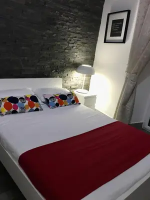 Letto o letti in una camera di FRANZ GUEST HOUSE