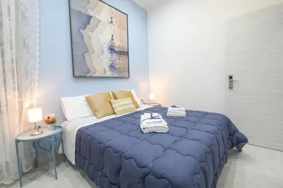Letto o letti in una camera di Il vicoletto di Santa Lucia