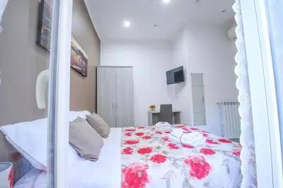 Letto o letti in una camera di Il vicoletto di Santa Lucia