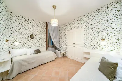 Letto o letti in una camera di La Casa di Assunta Naples Historical Centre