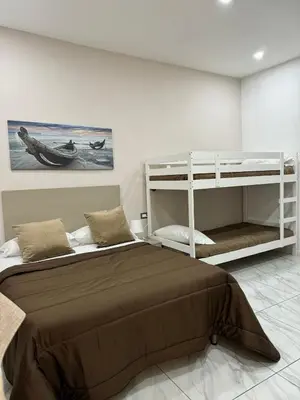 Letto o letti in una camera di Toledo Terminal Center