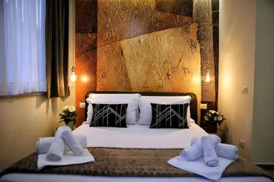 Letto o letti in una camera di Le Corti del Re
