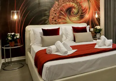 Letto o letti in una camera di Le Corti del Re