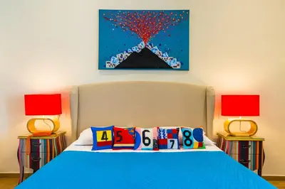 Letto o letti in una camera di La Gatta Cenerentola Rooms