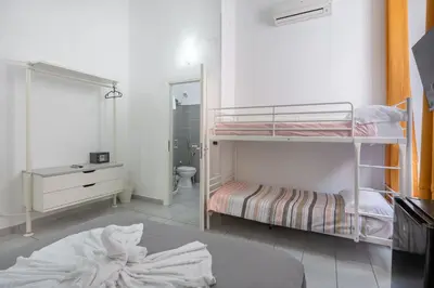 Letto o letti in una camera di Nina Suites