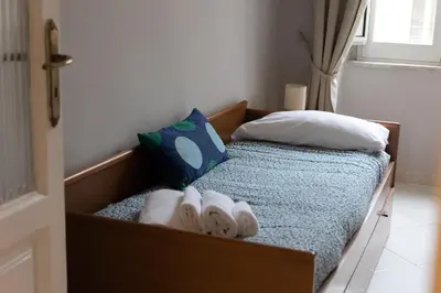 Letto o letti in una camera di A Casa di Titto guest house