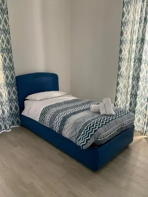 Letto o letti in una camera di La porta di Carmy