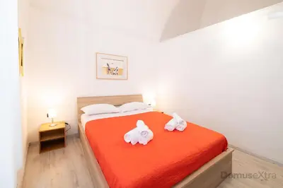 Letto o letti in una camera di Villari Guest House By DomusExtra