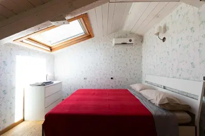 Letto o letti in una camera di Spaccanapoli casa tre santi