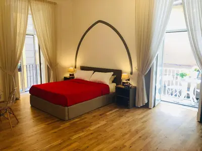 Letto o letti in una camera di Domus Studio 25 bed & breakfast