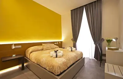Letto o letti in una camera di Domus Schilizzi
