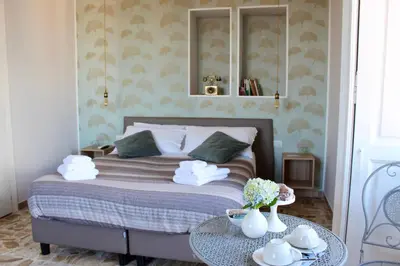 Letto o letti in una camera di N'Art Suites - Napoli