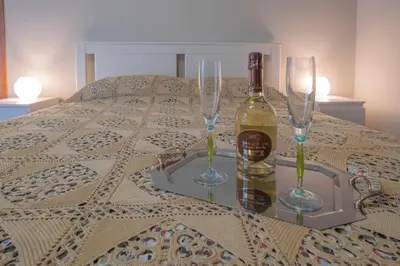 Letto o letti in una camera di b&b Immacolata