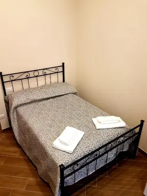 Letto o letti in una camera di Alexis Home