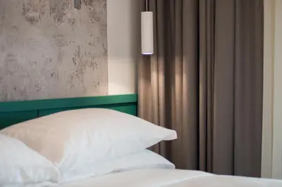 Letto o letti in una camera di Smart Hotel Napoli