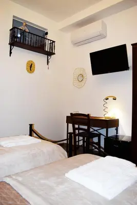 Letto o letti in una camera di Neapolis Pie